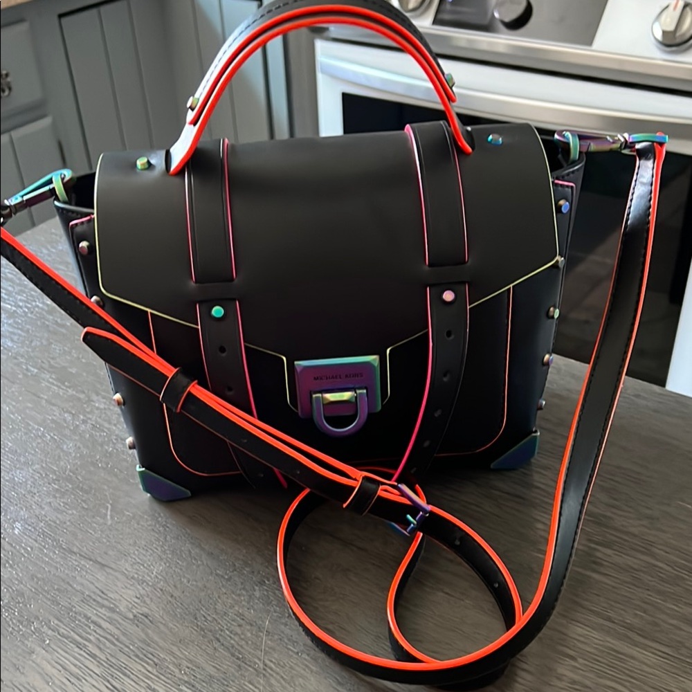 Michael Kors Black and Red Satchel with Bold Design